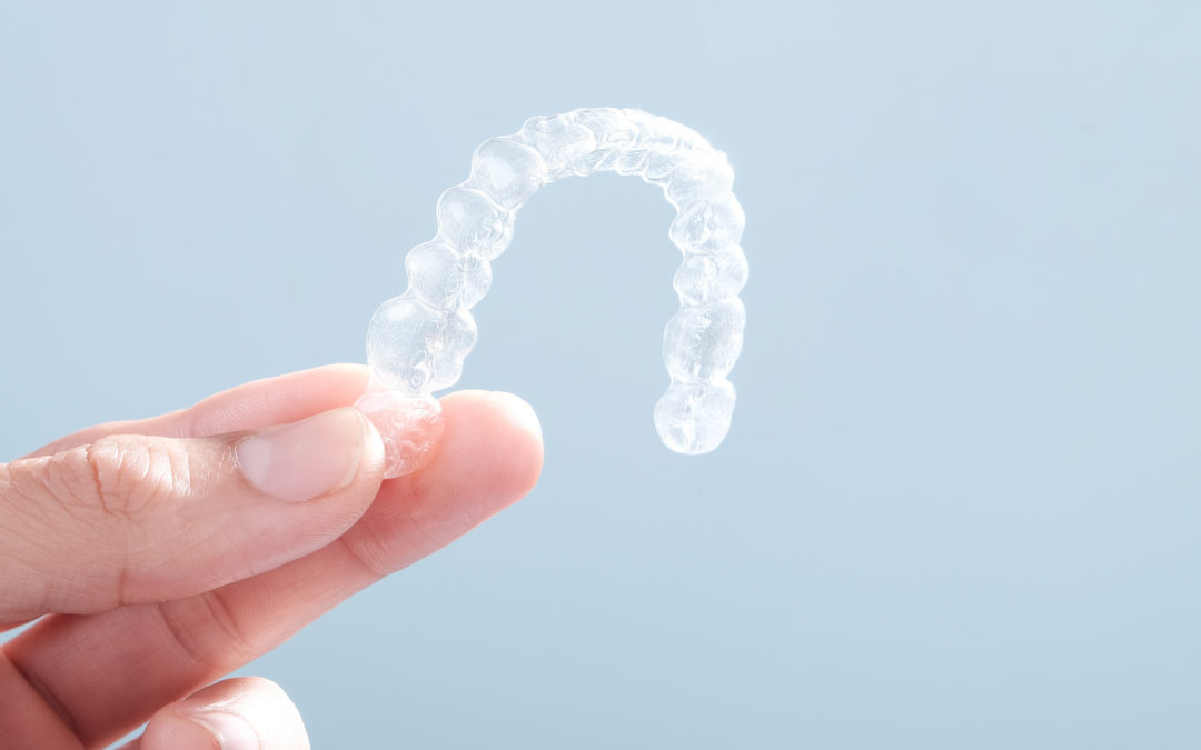 Invisalign Tips: How to Clean Invisalign Trays - Stonegate Dental